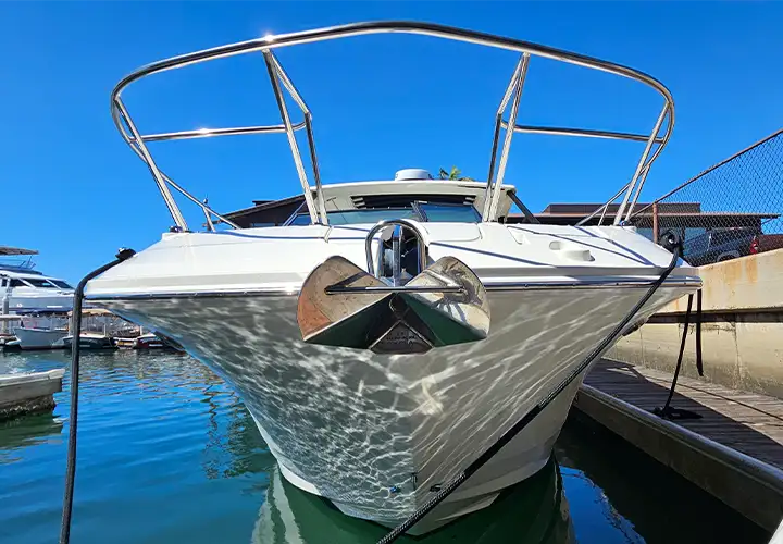 Close view of the Sea Ray bow, anchor and stainless steel rails